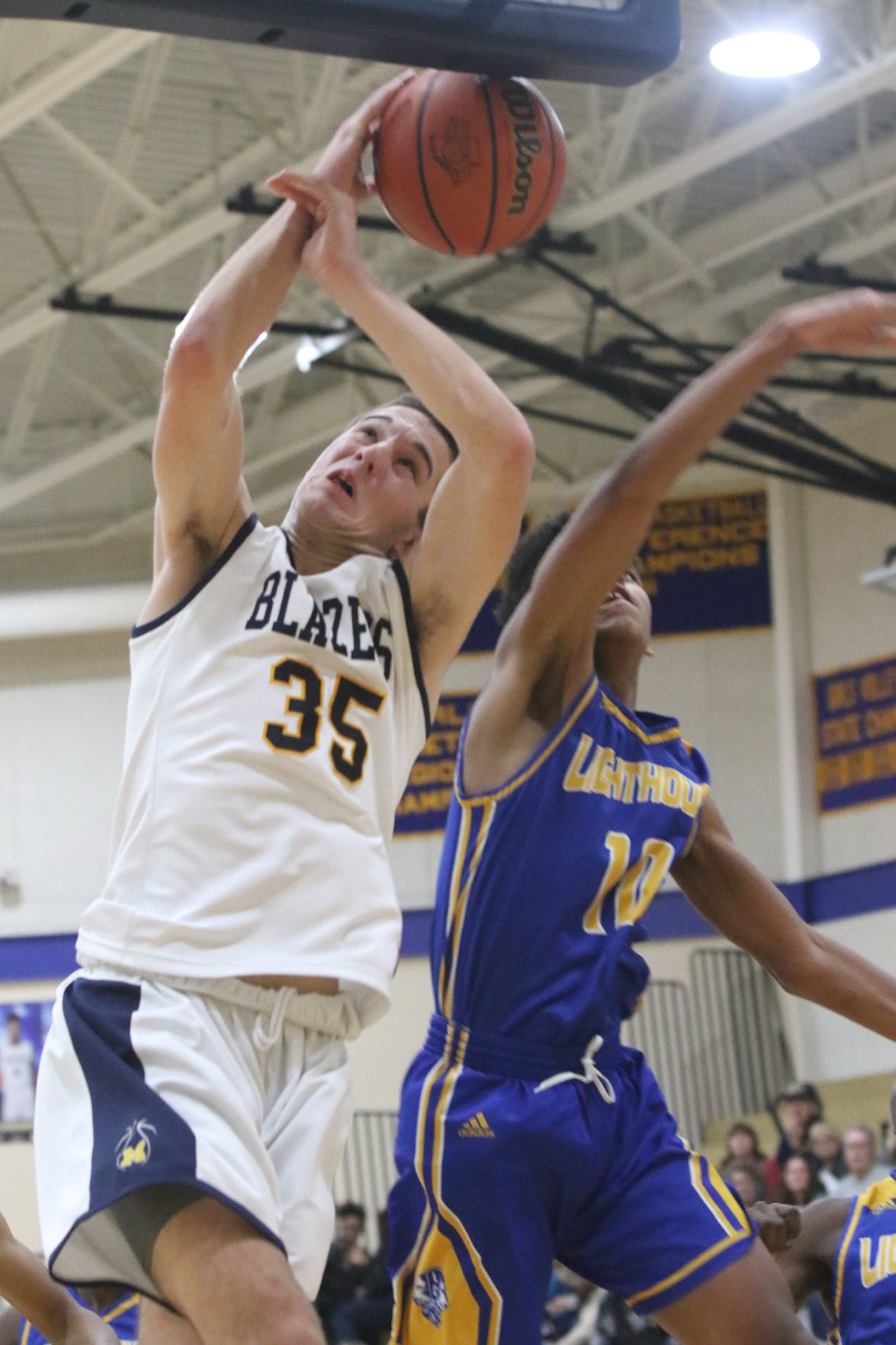 Gallery: Lighthouse at Marquette Catholic boys basketball
